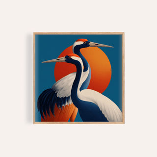 Framed print of two red-crowned cranes with an orange sun on a blue background