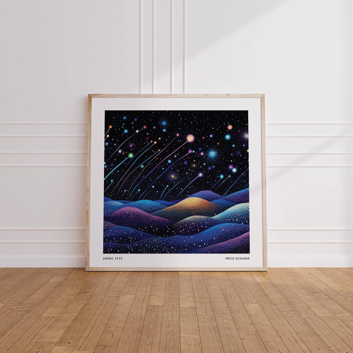 Galaxy wall art of colourful shooting stars above soft abstract hills leaning on wooden floor