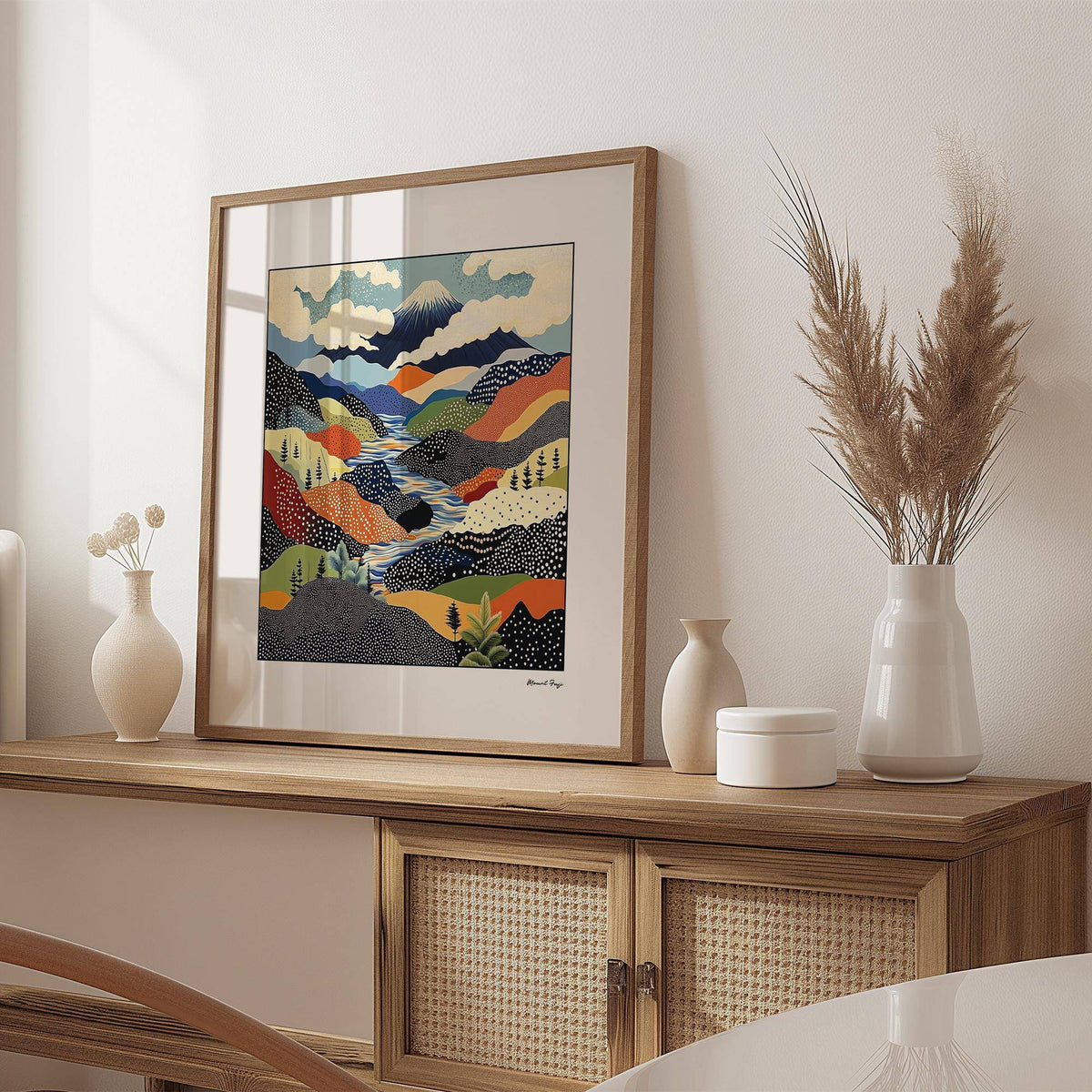 Japanese Art Prints mid-century style Mount Fuji wall art in blues and oranges above a wooden sideboard