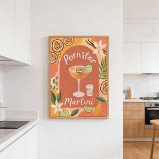 Framed Passion Fruit Martini Poster in a kitchen with a light wall and wooden floor