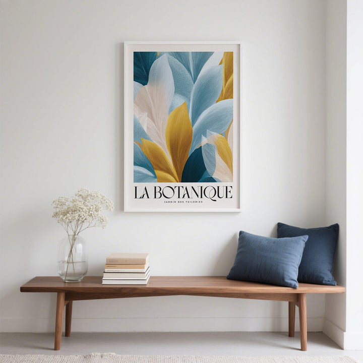 Wall Art Blue and Gold abstract botanical leaves print in blues and golds above a wooden bench with cushions