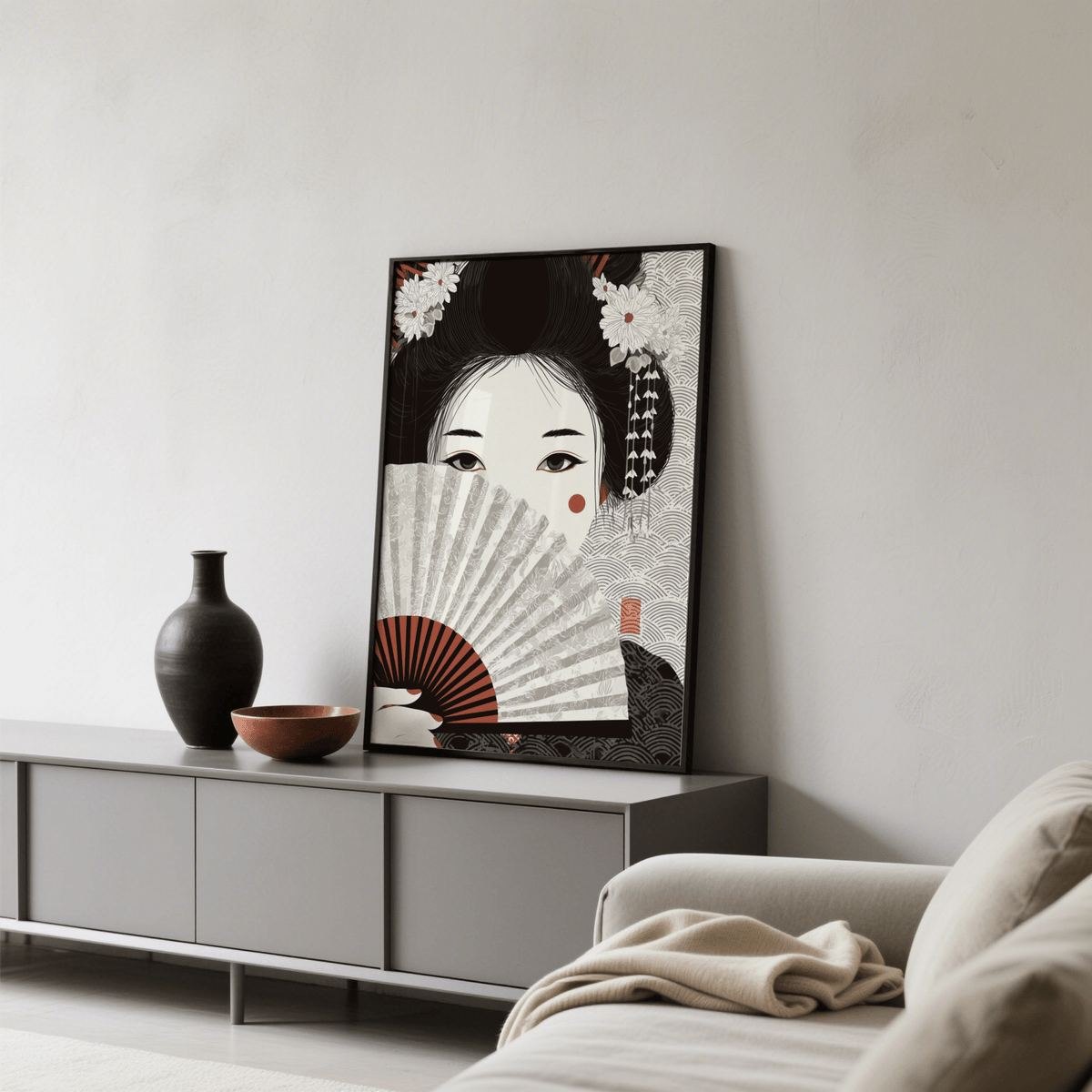 Japanese Geisha Art print leaning on a grey dresser with black vase and terracotta bowl in living room