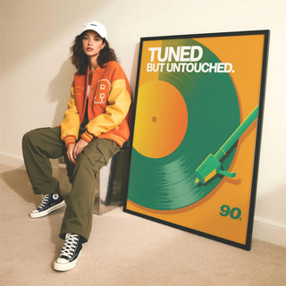 Vinyl Record Art Print leaning on floor beside person in a casual outfit