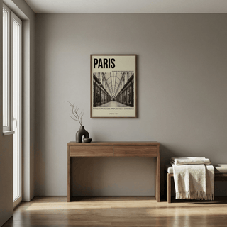 Parisian Passage Art Print on a grey wall above a wooden console table with a vase and a branch