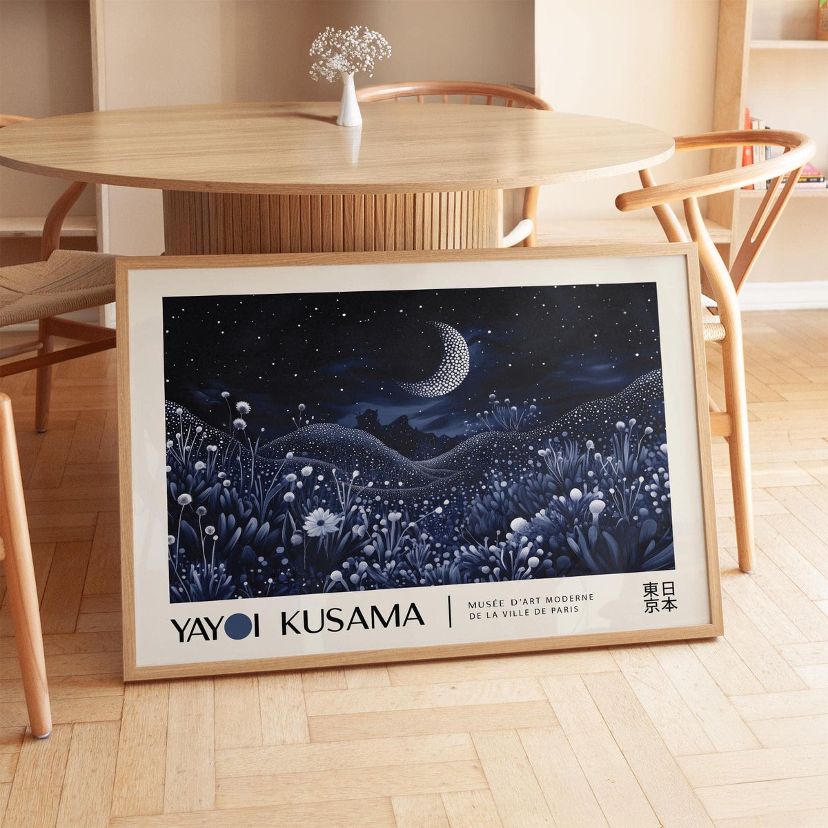 Night-Art print leaning on a parquet floor with dining chairs around a wooden table