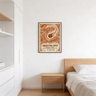 Argentina Open Poster print with vintage tennis ball illustration in brown and cream above a bedside table in a bedroom