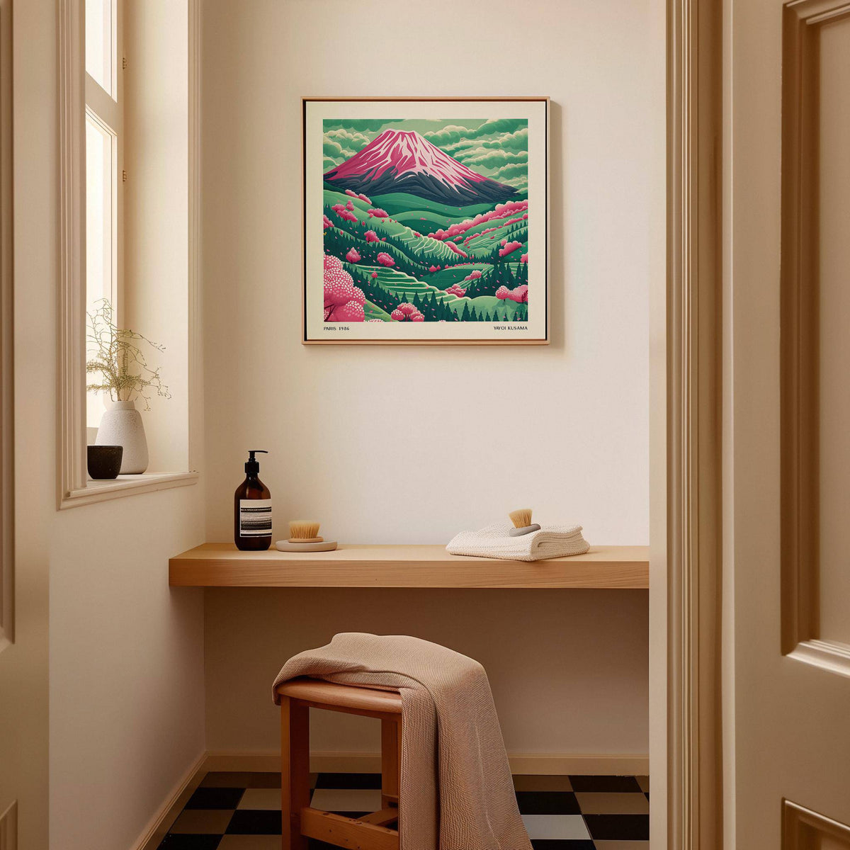 Mountain Landscape Art framed print of Mount Fuji with pink cherry blossoms above a wooden shelf in a hall