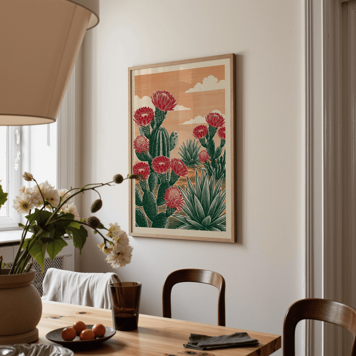 Cactus Desert Art print on wall with flower illustration and retro colour scheme in a dining room