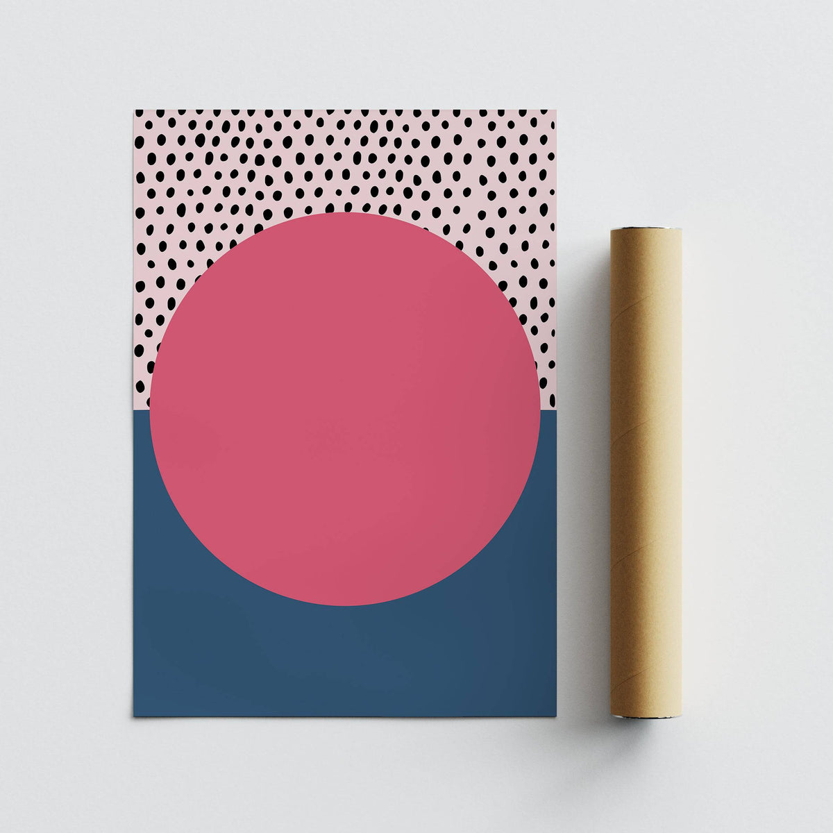 Modern Abstract Art Geometric with a large pink circle and black dots beside a beige packaging tube