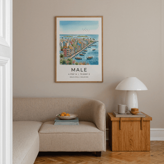 Maldives City Art Print watercolour of a coastal town with boats above a beige sofa