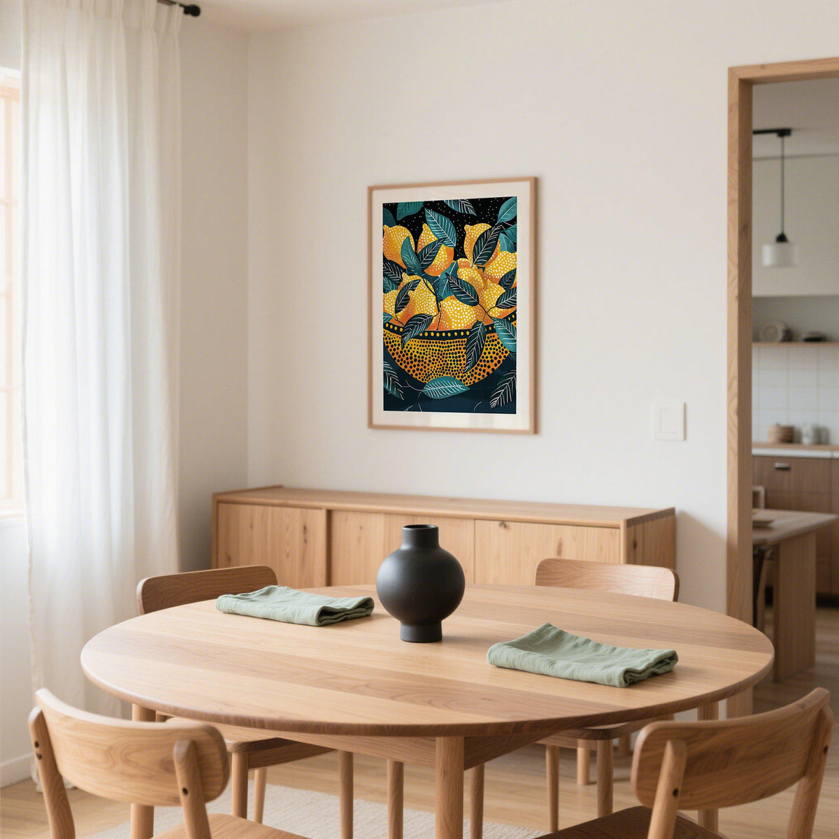 Lemon wall art illustration of lemons in a dotted bowl with blue leaves in a dining room
