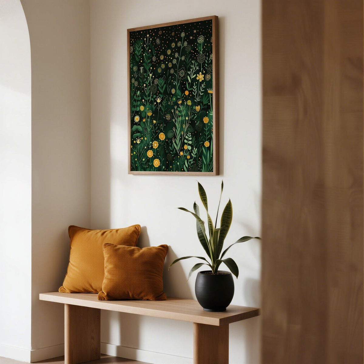 Green Decor wall art of yellow flowers and green foliage hanging above a wooden bench with cushions