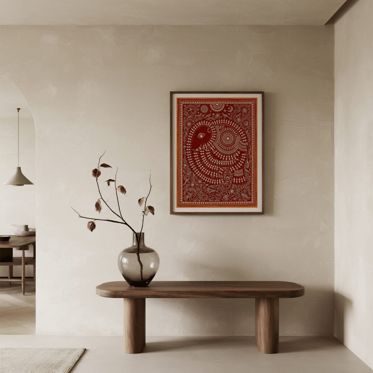 Indian Folk Art Poster print on a wall with a decorative elephant in rust and cream above a wooden table with a vase