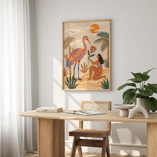 Tropical Bird Artwork print on a wall with natural colours and a table with books in a bright room