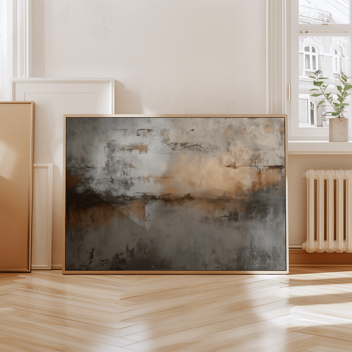 Abstract Gray Art Print leaning on a wooden floor near a radiator and window with natural light