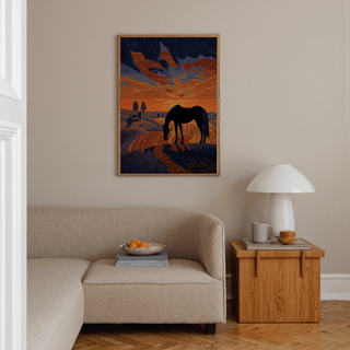 Horse Sunset Art Print in a living room with beige sofa and wooden side table with lamp