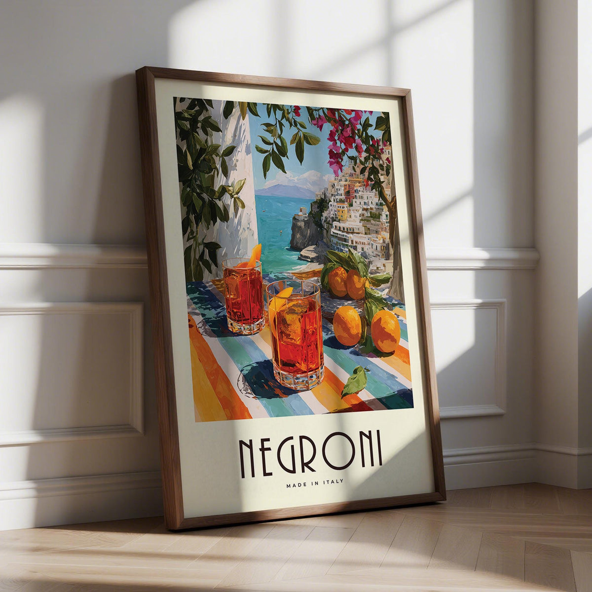 Framed Italian Drink Posters print leaning on floor with shadows and wood frame