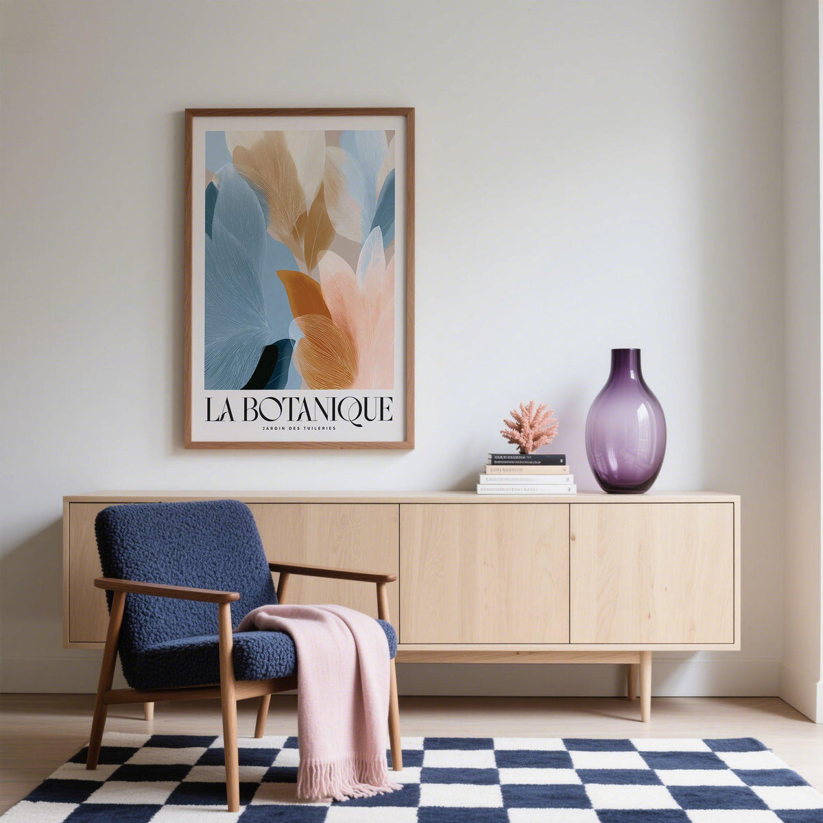 Blue Pink wall art with abstract botanical leaves in soft blue, beige and pink above a wooden sideboard with a purple glass vase