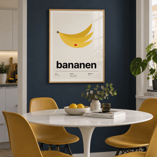 Swiss style banana typography print in a dining against an ink blue wall