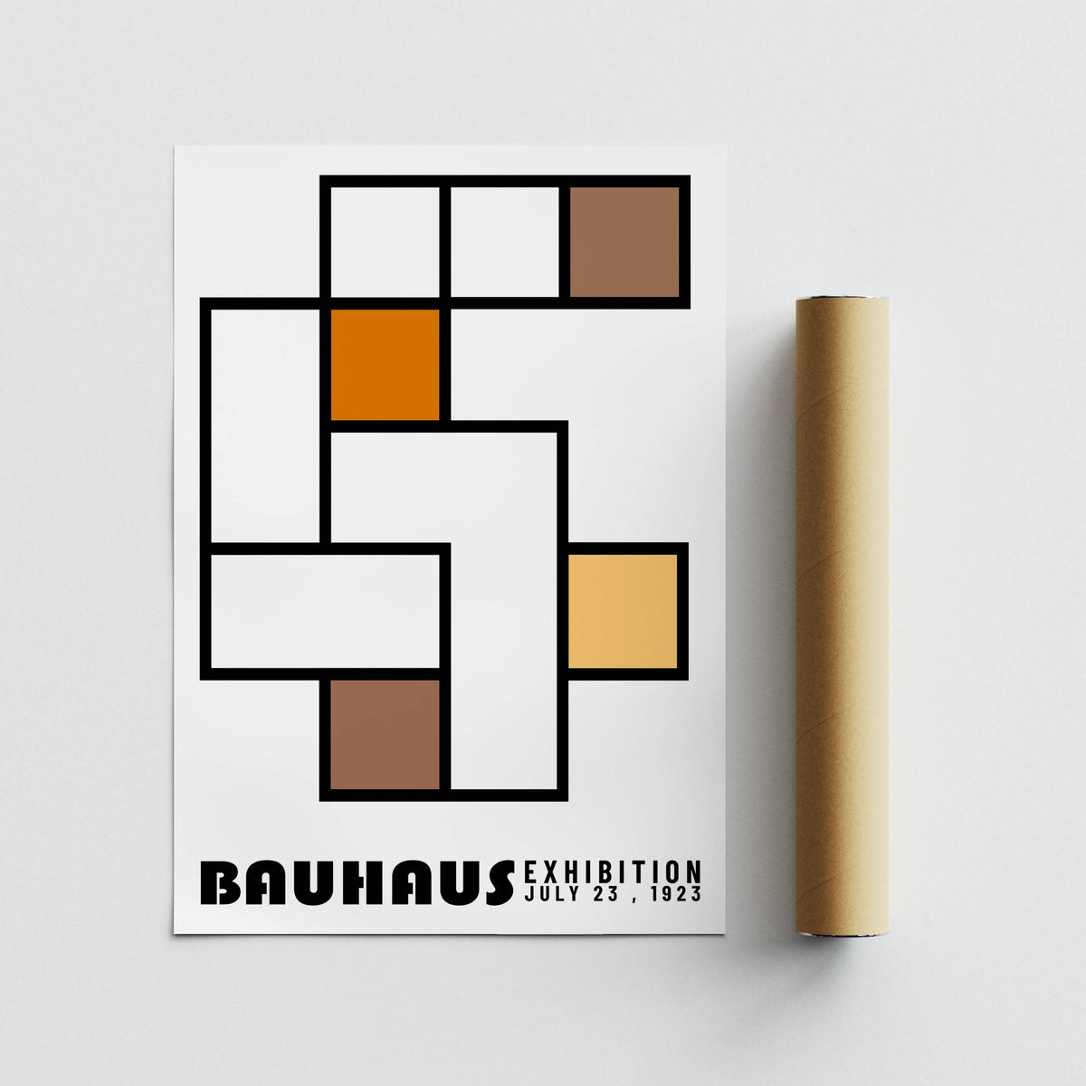 Geometric Abstract Art print with bauhaus style blocks and text next to a brown packaging tube