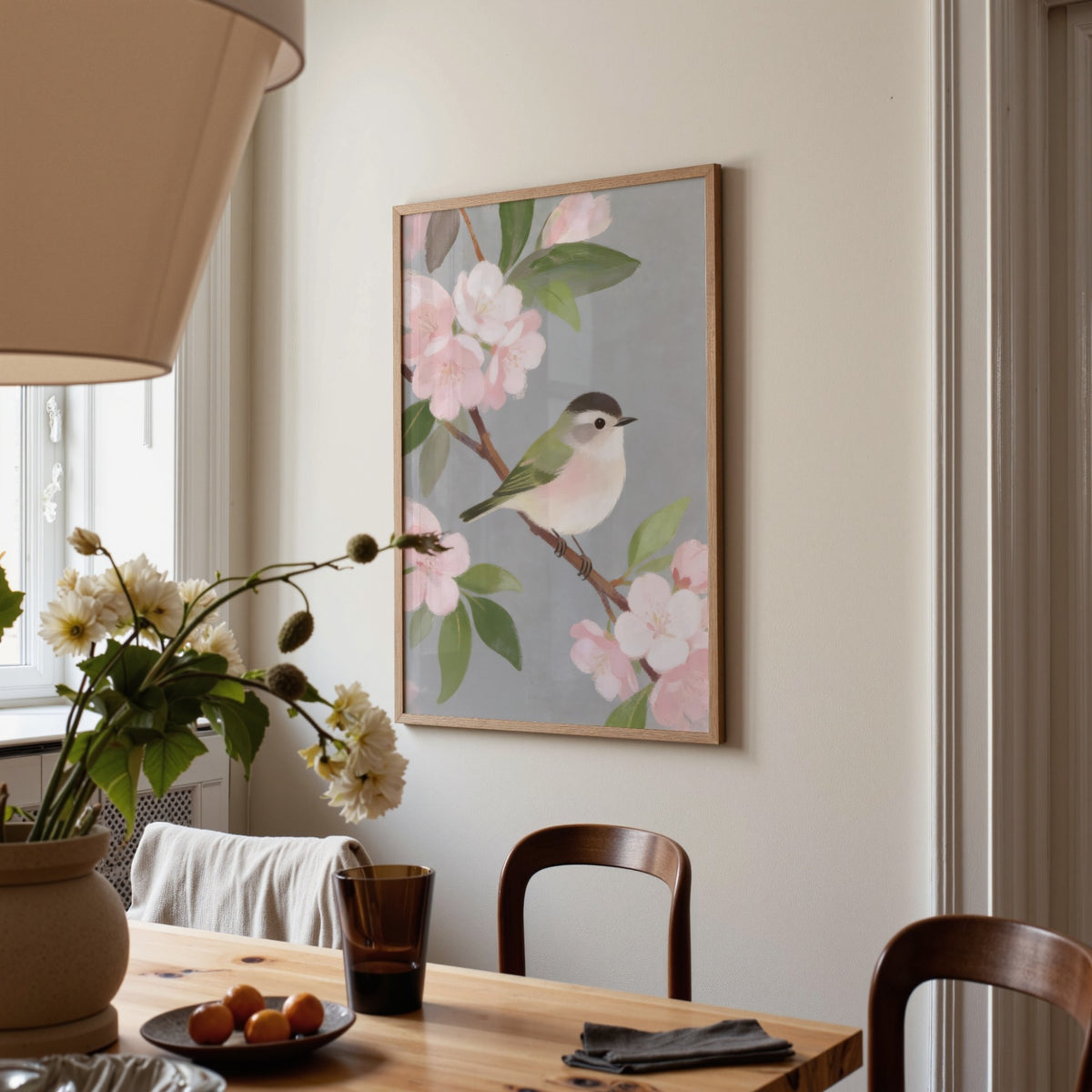 Botanical Bird Wall Art print on a dining room wall with wooden furniture and flowers on the table
