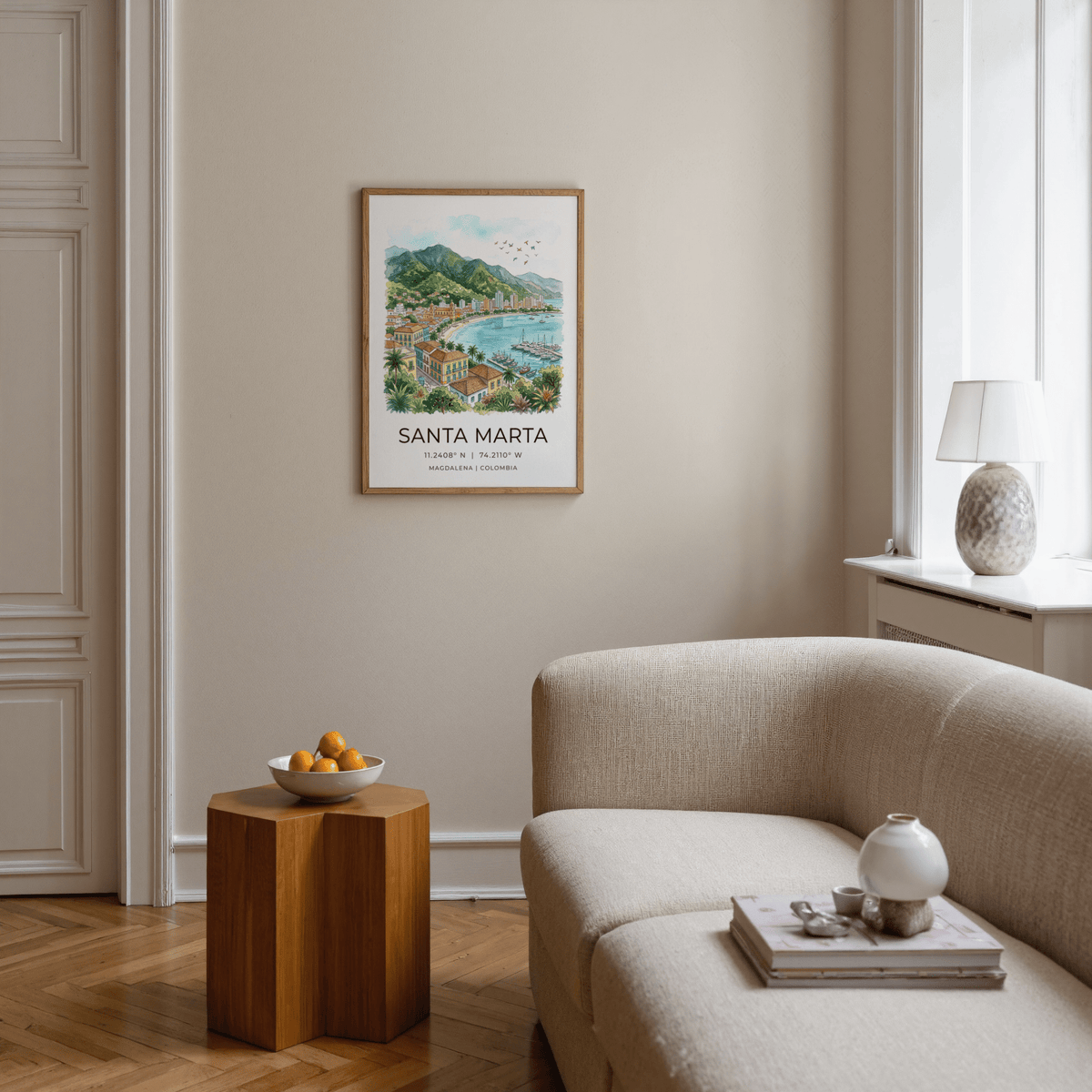 Santa Marta art print of the coastline in watercolour hanging above a sofa in a bright living room