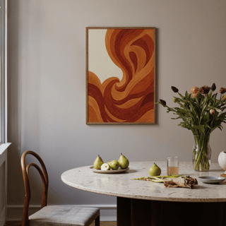 Abstract Wave Art Print framed on a grey wall with a marble dining table and green pears in front