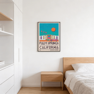 Palm Springs Art Print of a retro desert house illustration in turquoise and orange above a bedside table in a bedroom