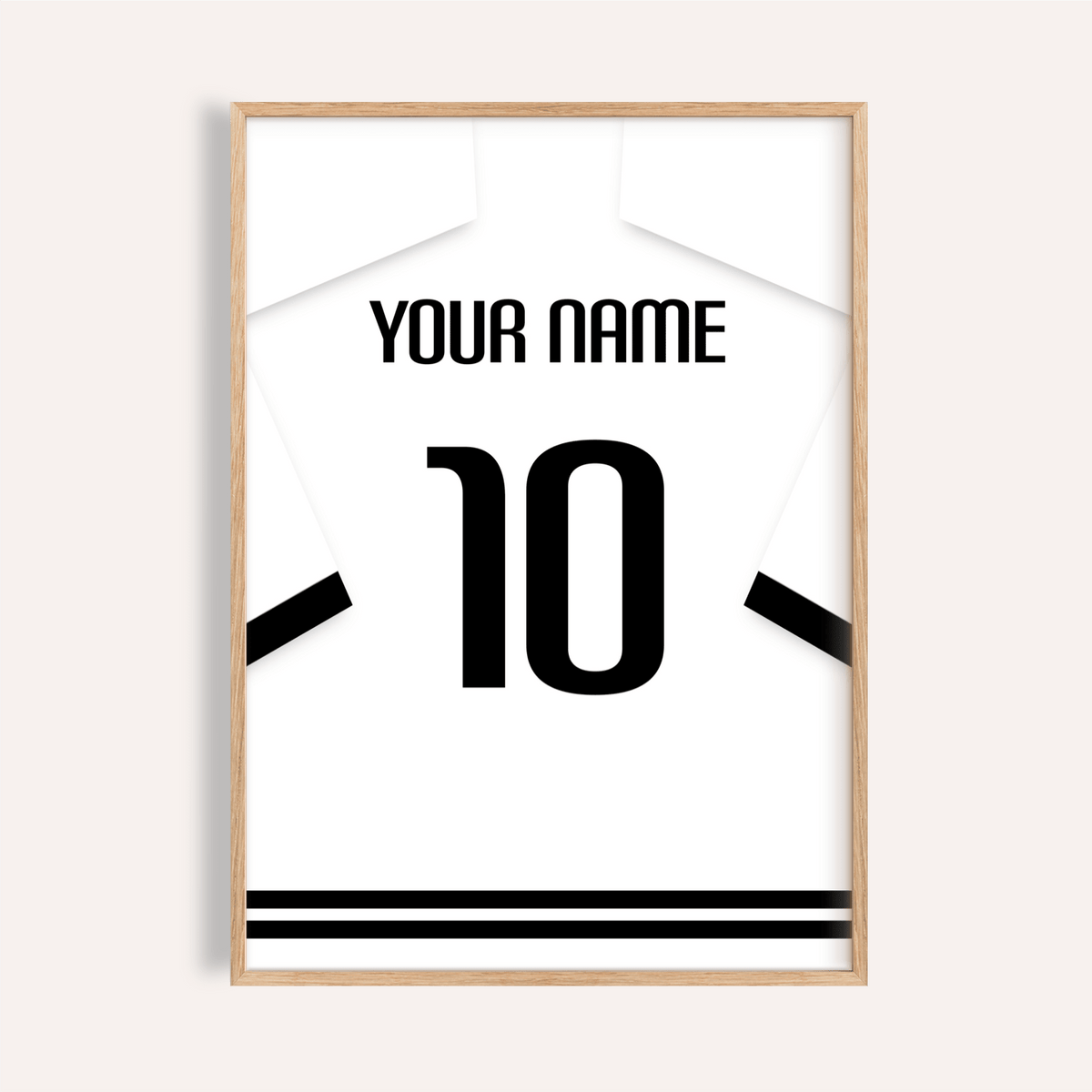Framed print close-up of a football shirt poster in white with black banded sleeves and number 10