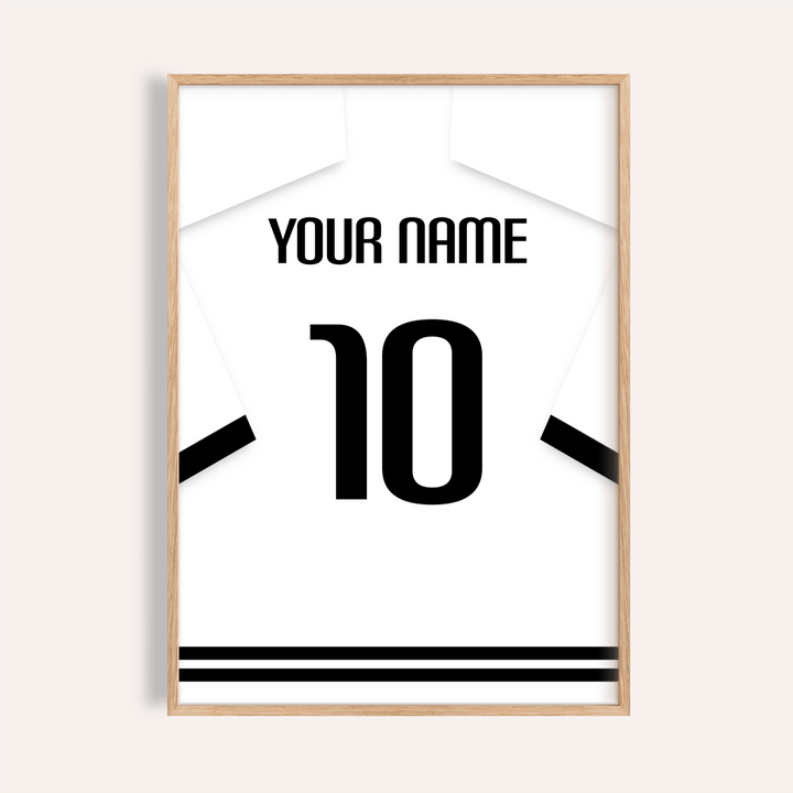 Framed print close-up of a football shirt poster in white with black banded sleeves and number 10