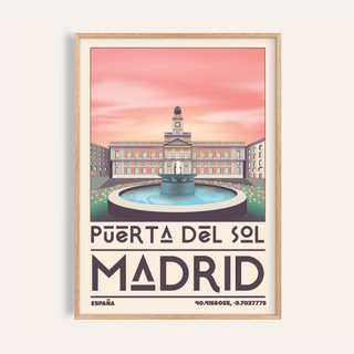 Framed Madrid Landmark Art Print of Puerta del Sol plaza with pink sky and typographic details