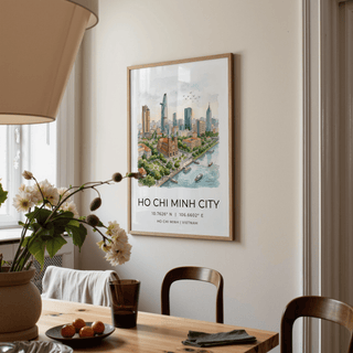 Ho Chi Minh City wall art watercolour print in a dining room with a wooden table and flowers
