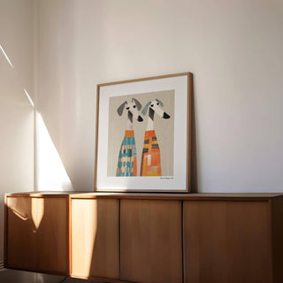 Wall Art Dog print leaning on wood sideboard with natural light and shadows