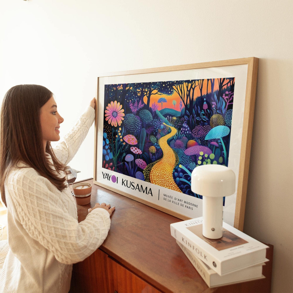 Mystical Prints framed print close-up of glowing yellow path and colourful plants above a wooden sideboard with books
