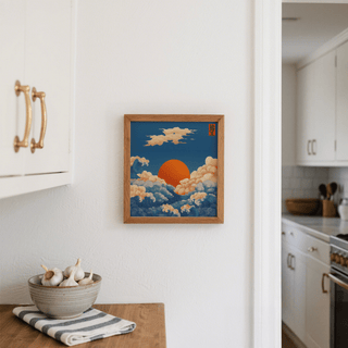 Square prints for wall showing an orange sun and ocean waves in japanese-ink style in a kitchen