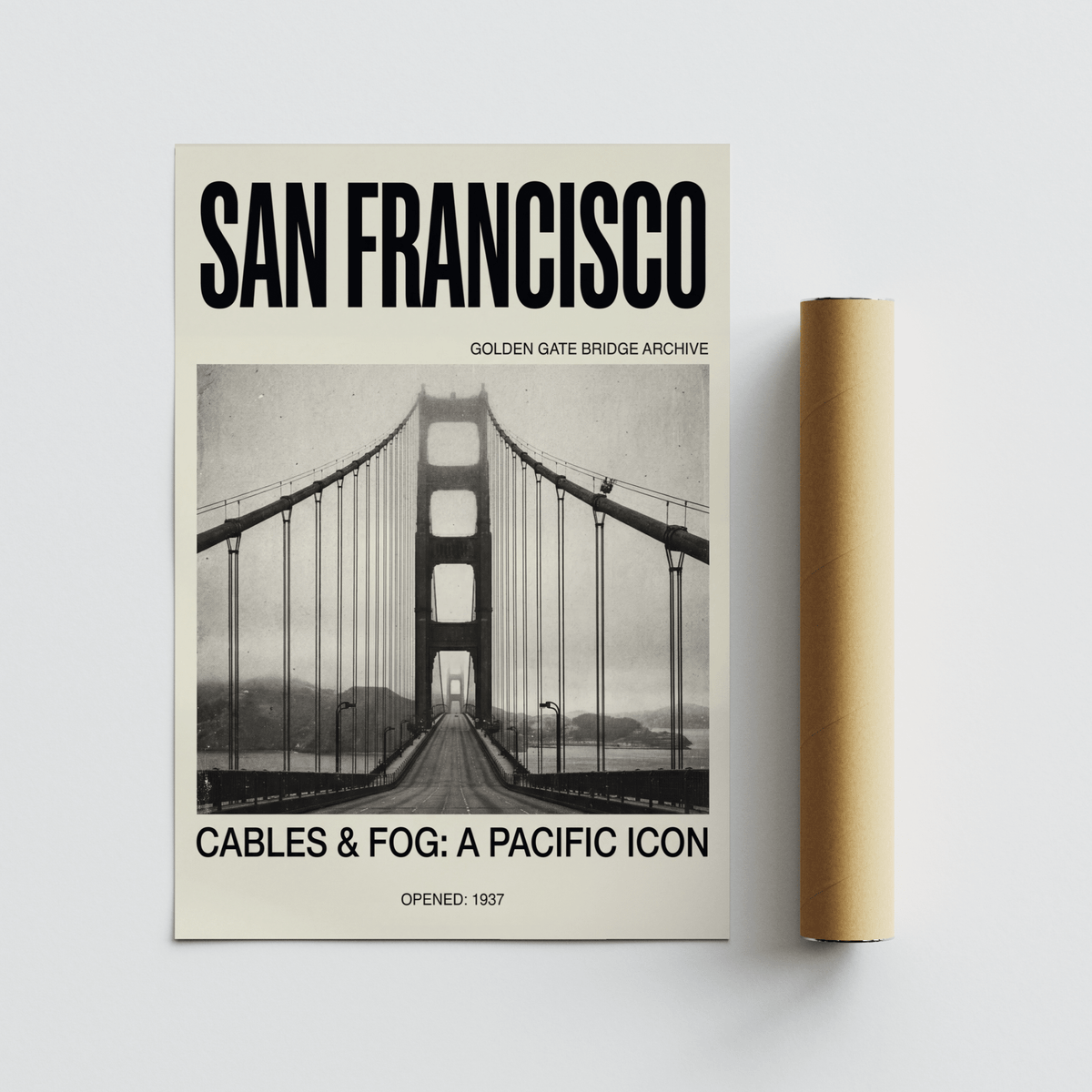 Golden Gate Bridge art print lying flat next to a brown packaging tube showing the bridge in fog