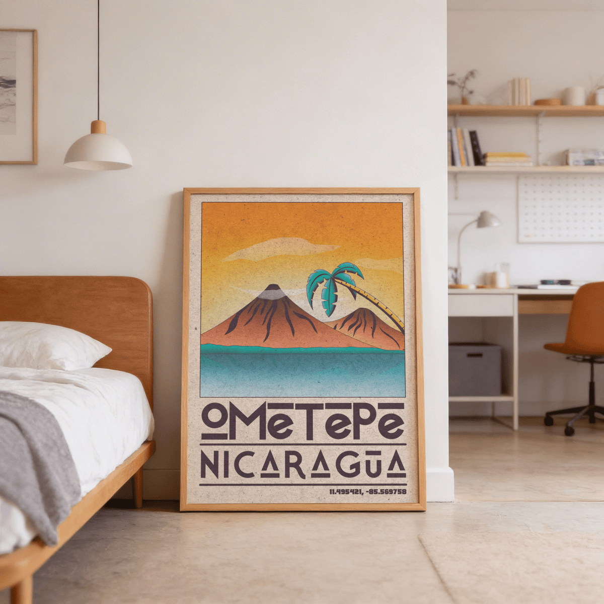 Print leaning on the floor of a bedroom of a tropical paradise with volcanoes and a palm tree in retro style