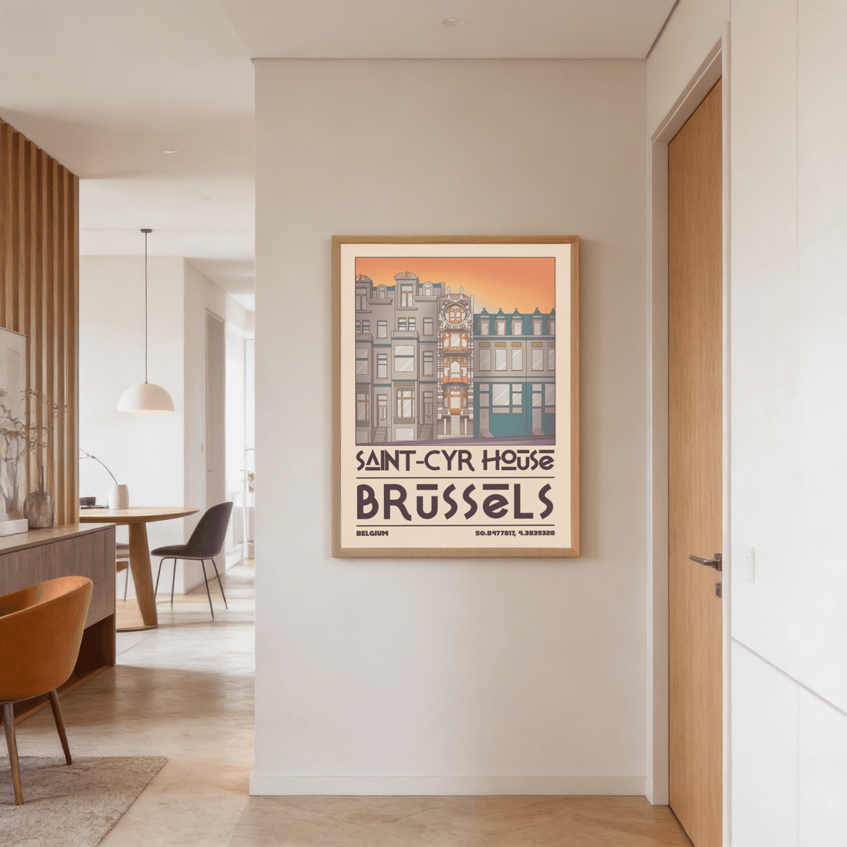 Saint Cyr House Poster printed artwork in neutral tones hanging in a hallway with a wooden door