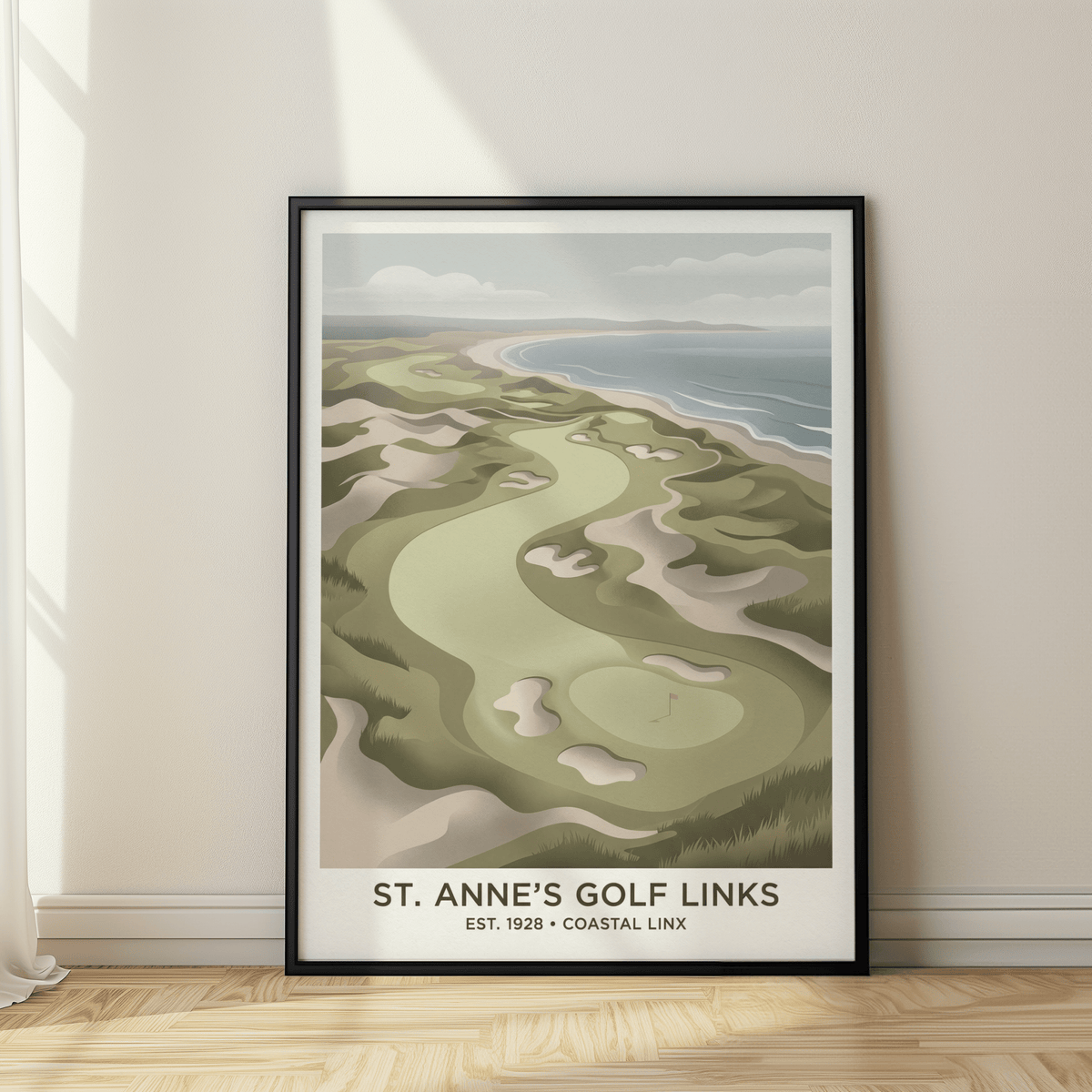 Framed print close-up of coastal golf landscape with green and sand tones leaning on wooden floor