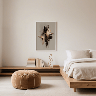 Black and gold poster on a bedroom wall above a wooden shelf with books and a decorative sculpture