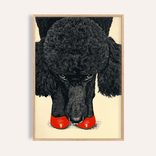 Framed close-up of Poodle wall art showing a black poodle with red shoes on a cream background