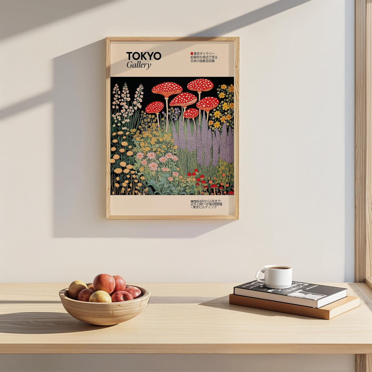 Japanese Vintage Art print of red fly agaric mushrooms and flowers hanging on a wall above a bowl of fruit