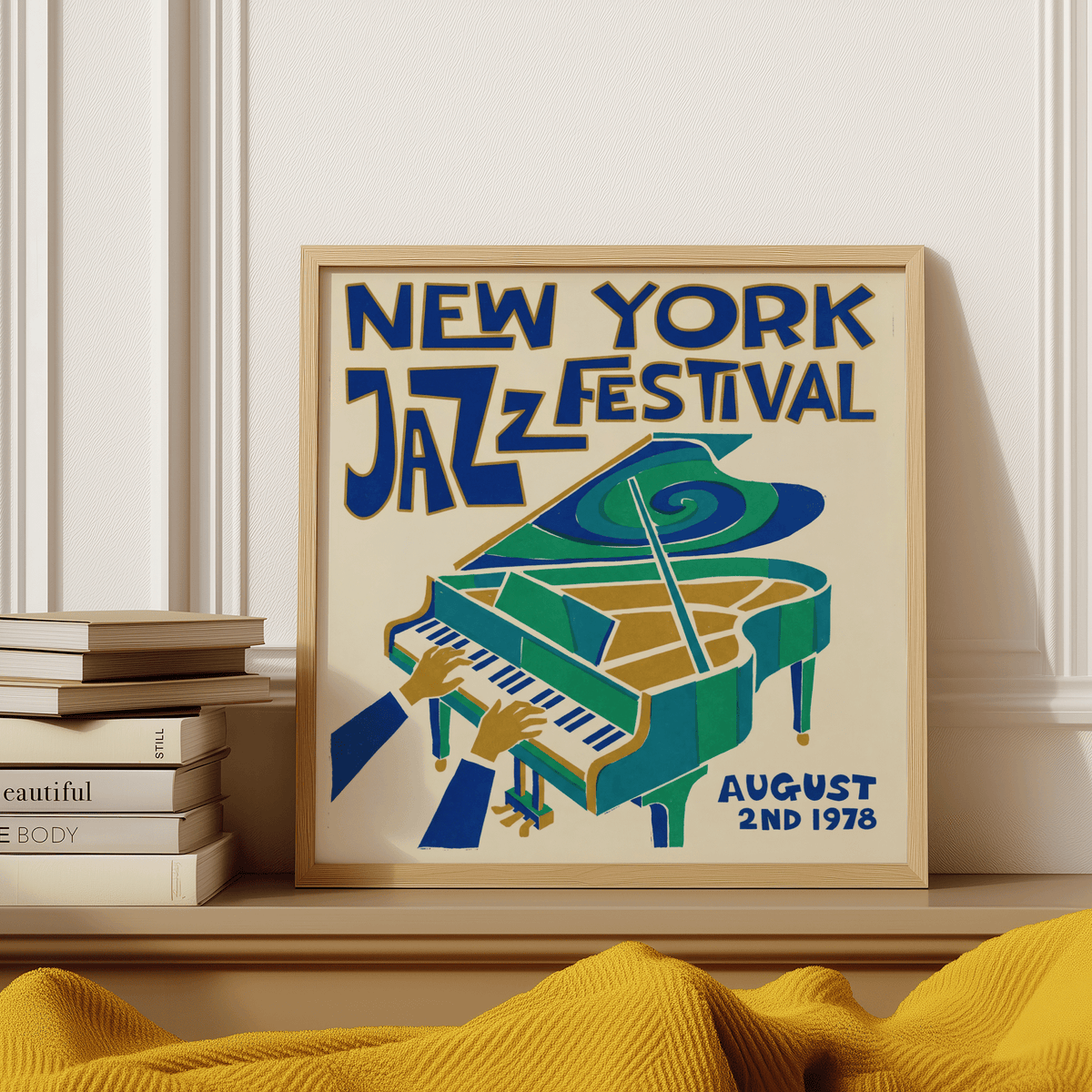 Print showing New York Jazz Festival illustration with a green piano and typographic text leaning on a shelf beside books