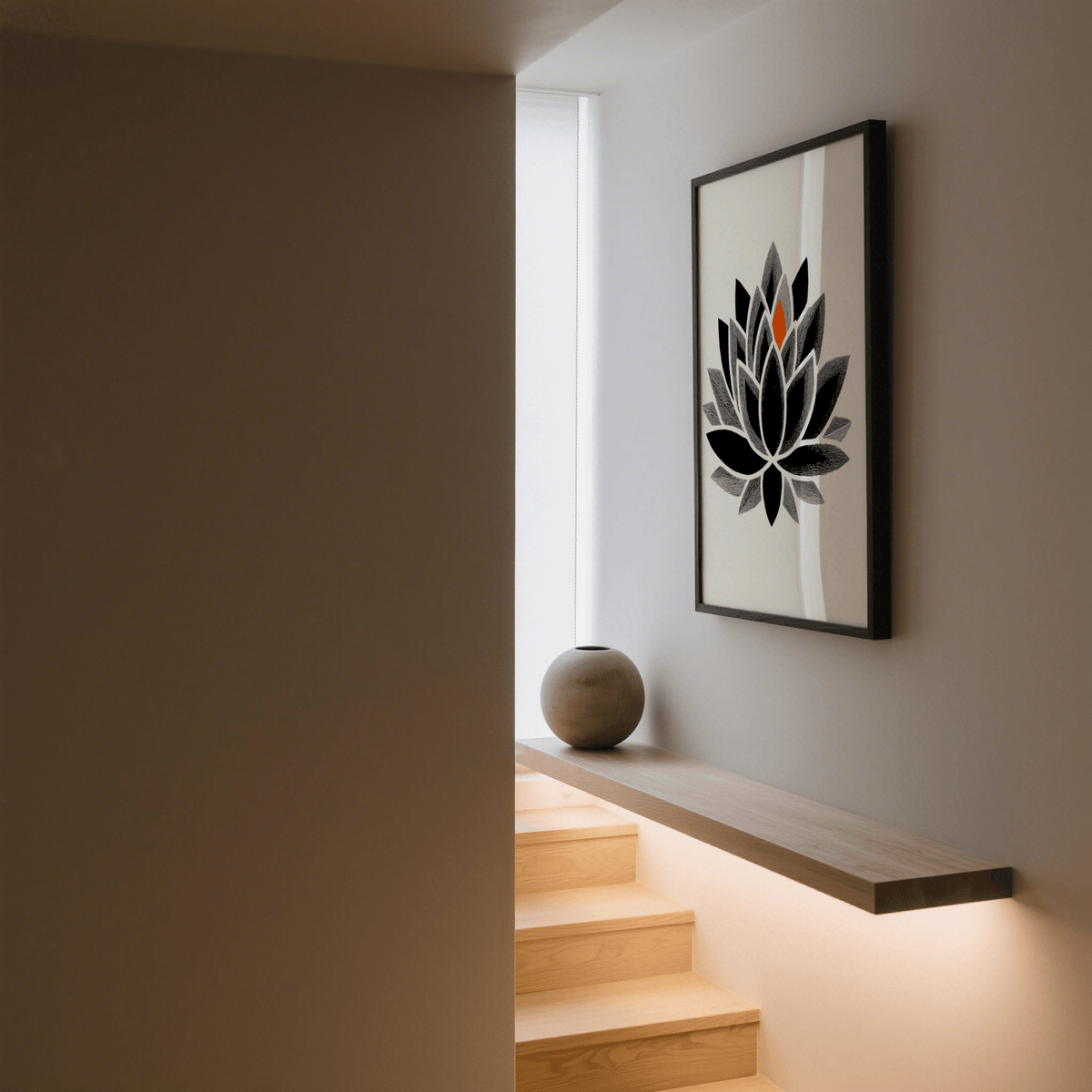 Lotus Art Print hanging above a wooden shelf with a round stone vase in a stairwell