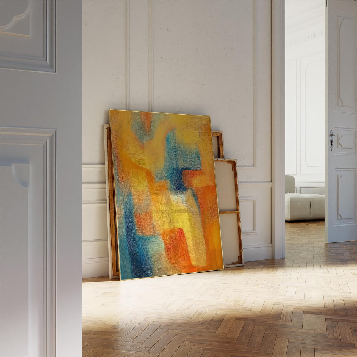 Modern Art Posters leaning print with abstract colourful shapes in yellow blue and orange against a white wall