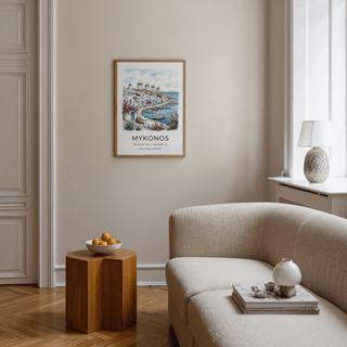 Mykonos art print of seafront with windmills in watercolour hanging above side table with bowl in living room
