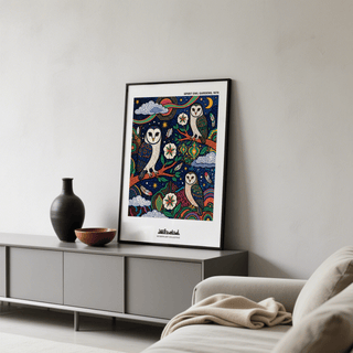 Spiritual Garden Poster print leaning on a grey sideboard with dark vases nearby in a living room