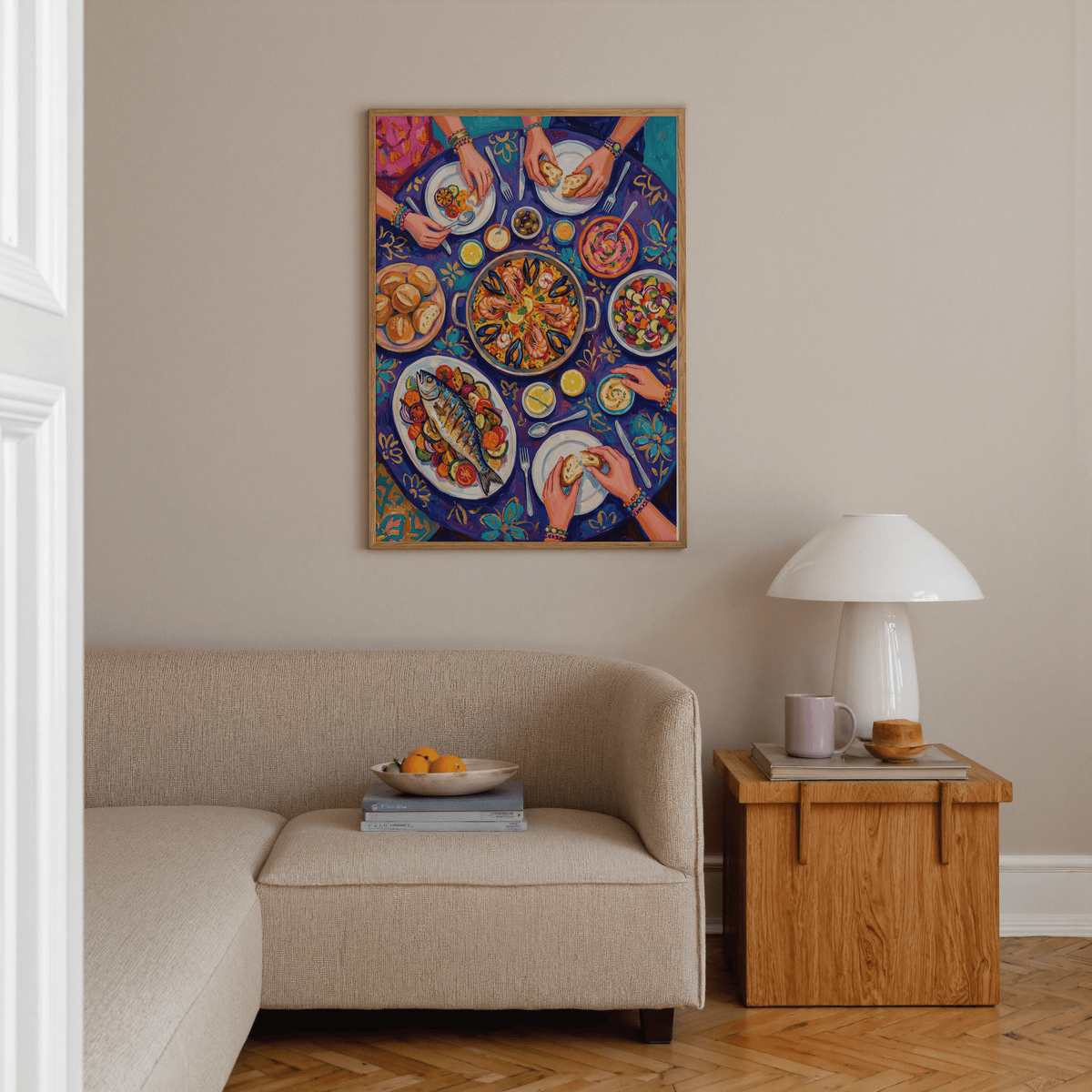 Food Art Print on a dining room wall showing a vibrant Mediterranean feast with purple and blue tones above a beige sofa