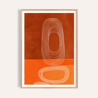 Framed abstract line art print of nested ovals in shades of red and orange