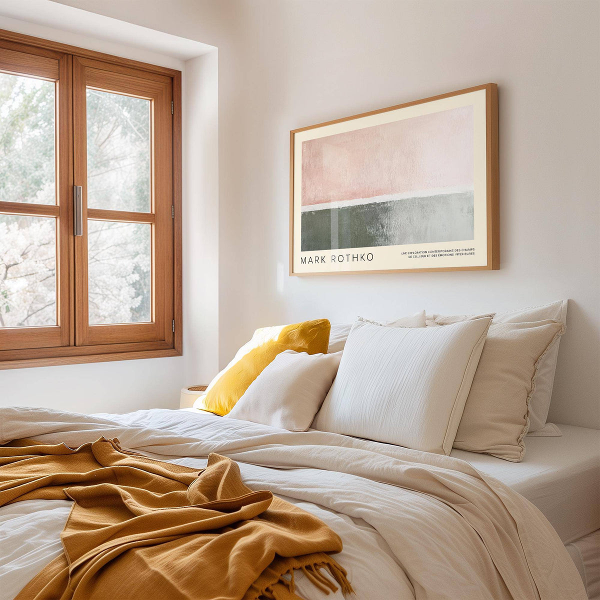 Horizontal wall decor with pink and grey abstract blocks above a bed with white and yellow cushions